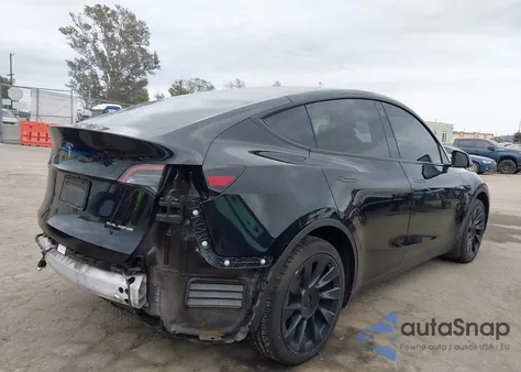 2023 Tesla Model Y Awd/Long Range Dual Motor All-Wheel Drive z USA, uszkodzony, nr VIN 7SAYGAEE7PF741916